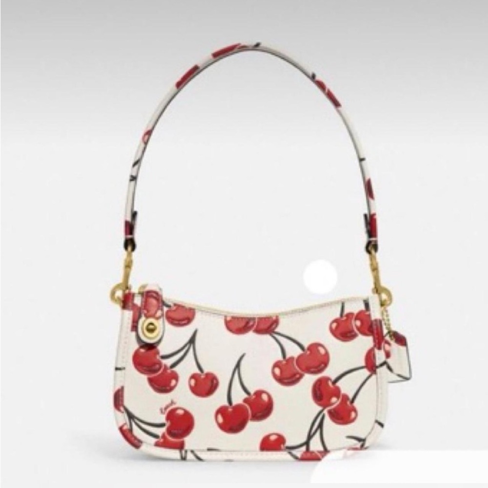 Coach Swinger purse in Cherry Print